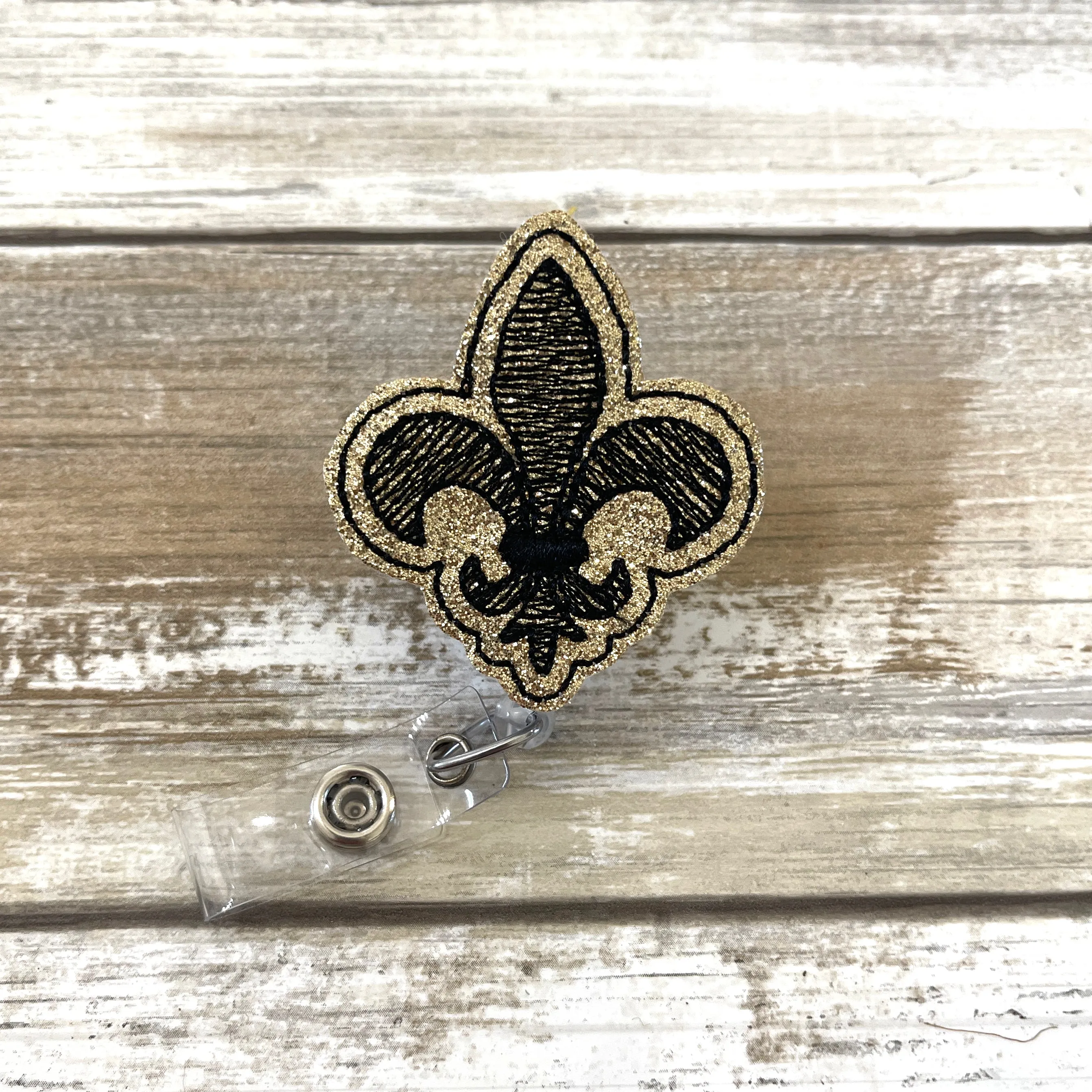 Fleur De Lis Badge Reel