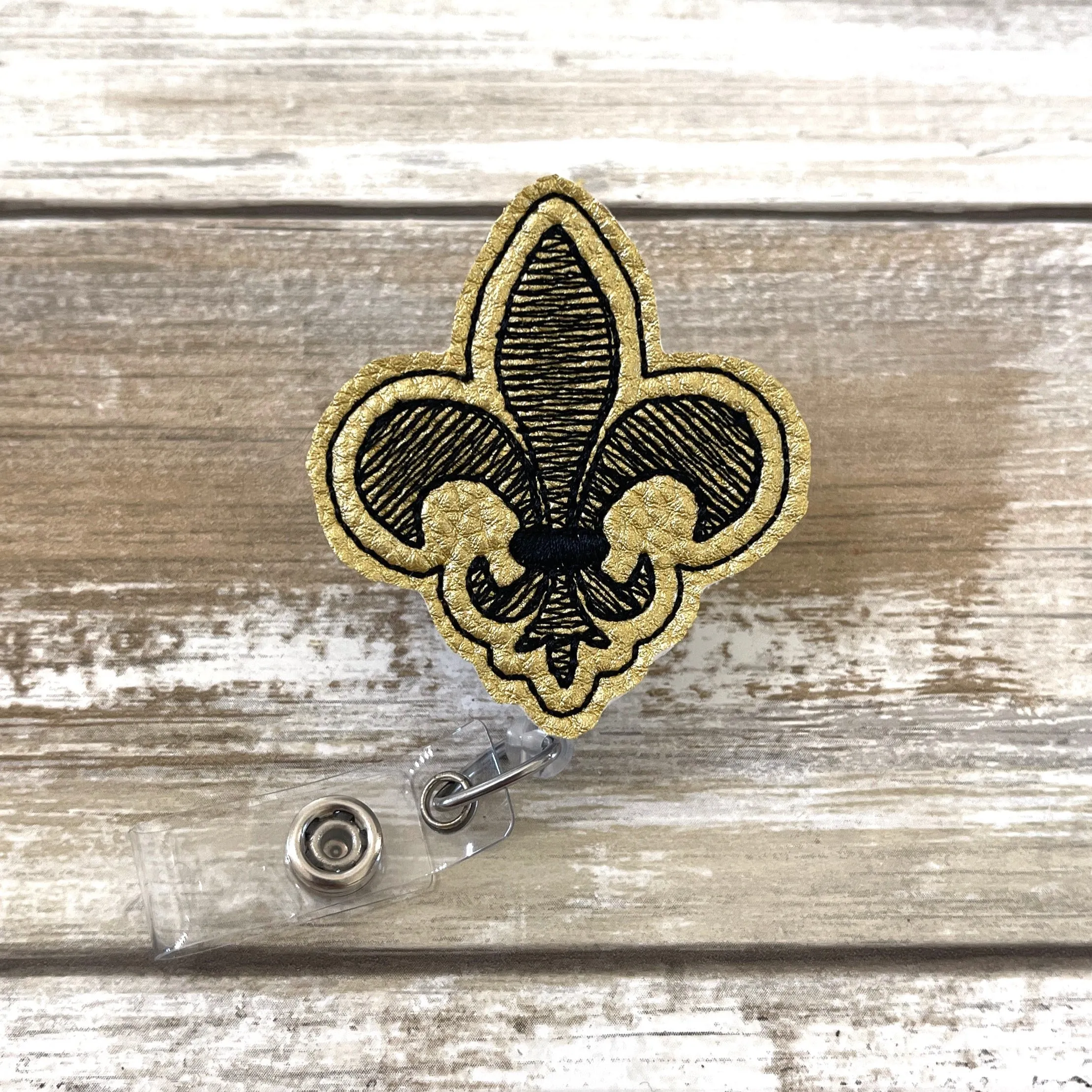 Fleur De Lis Badge Reel